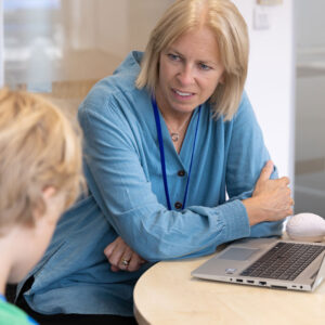 Consultant Paediatrician Karen Street working one-to-one with a child during an assessment